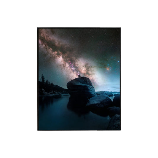 Magical Reflections: Rocks in Water Under a Starry Night Sky